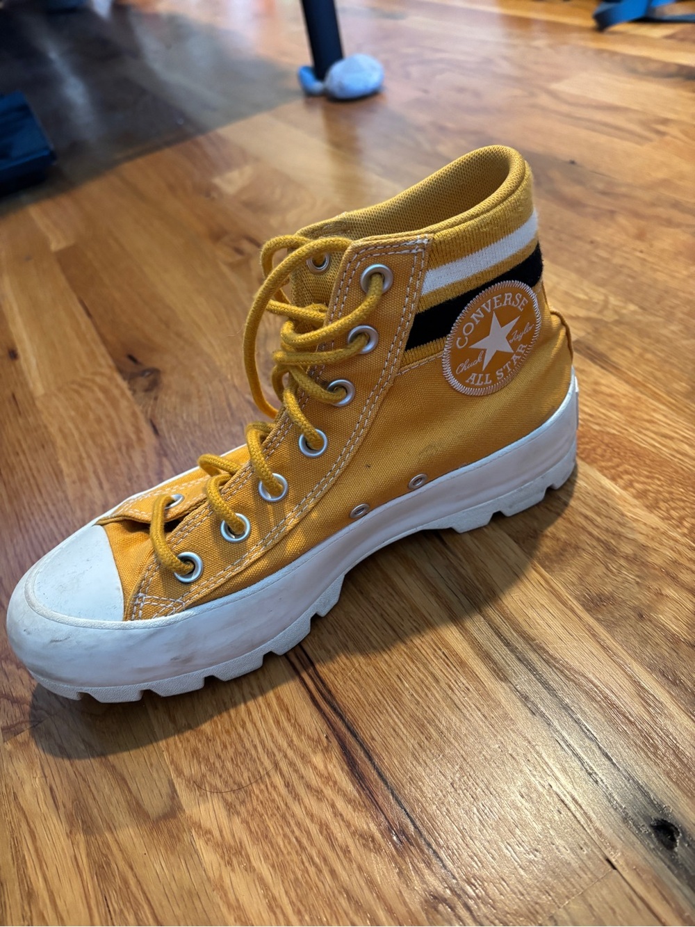 Converse Women’s Yellow High-Top Canvas Sneaker with Black Stripe